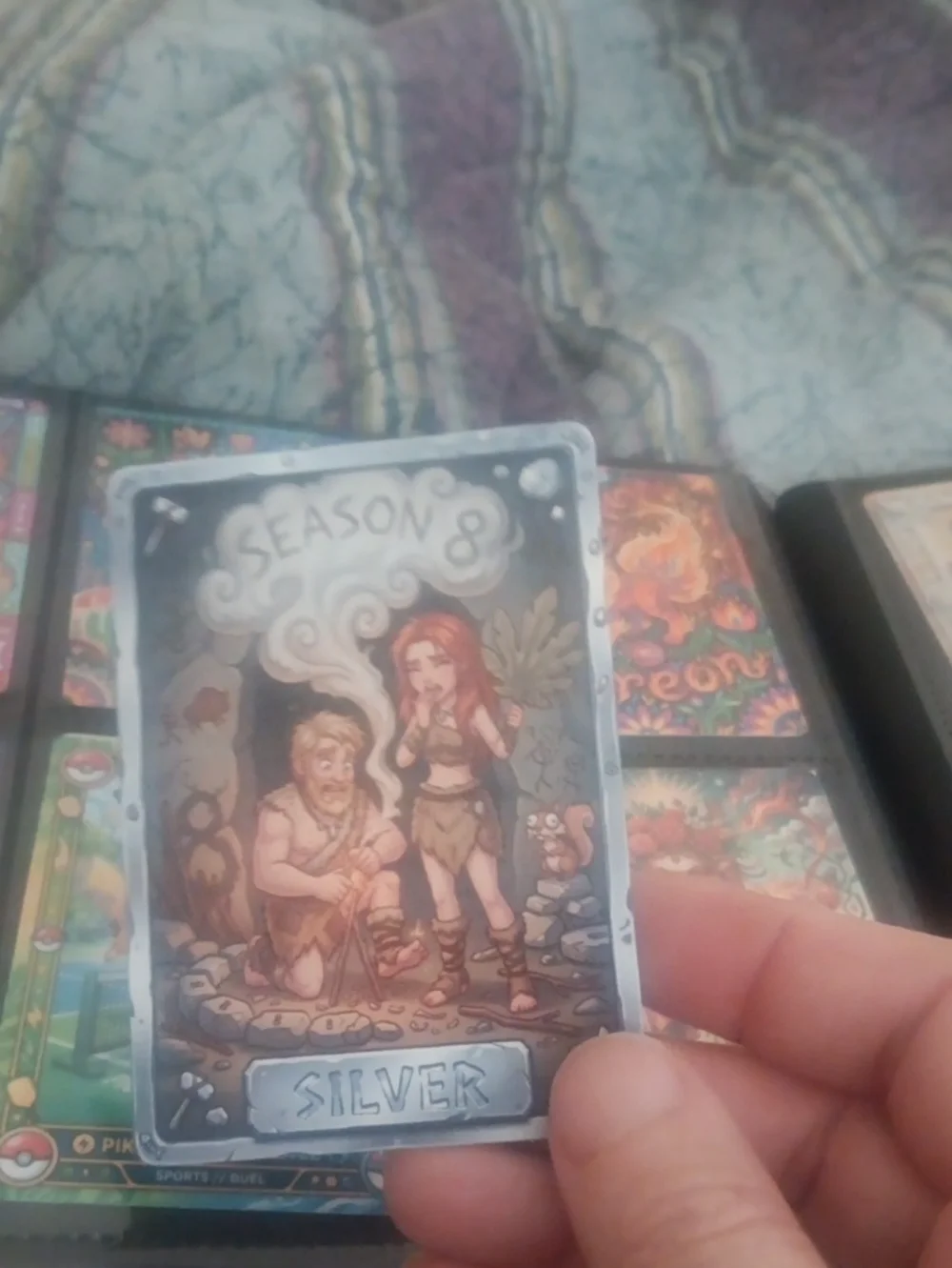 Season 8 Silver Trading Card – Blue and Brown Artwork